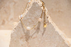Sol & Aura - Pearla Bracelet - 4 natural pearls on bracelet on thin gold chain on stone surface