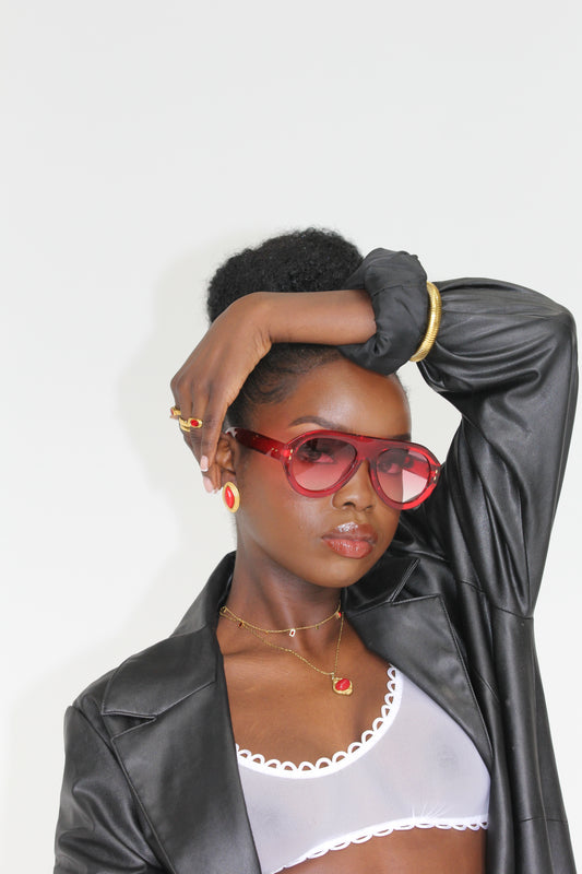Sol & Aura - Pharaoh Earrings, Fiesta Sunglasses, Darci Necklace all in red on woman wearing black leather jacket