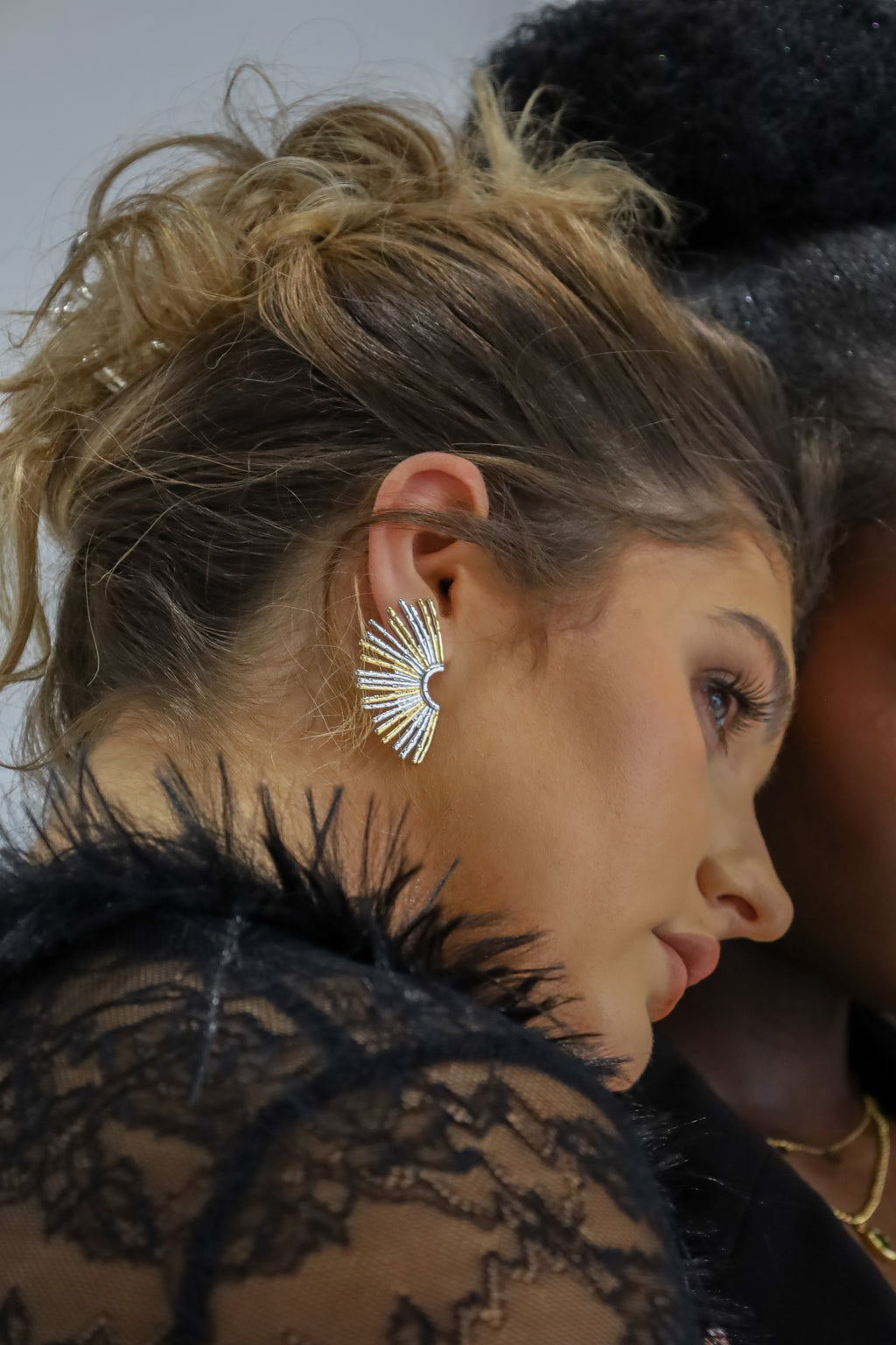 Sol & Aura - Ray Earrings worn by woan in black lace top with hair up